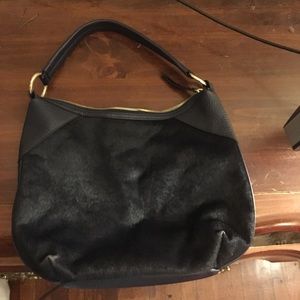 Margot leather and faux hair purse.